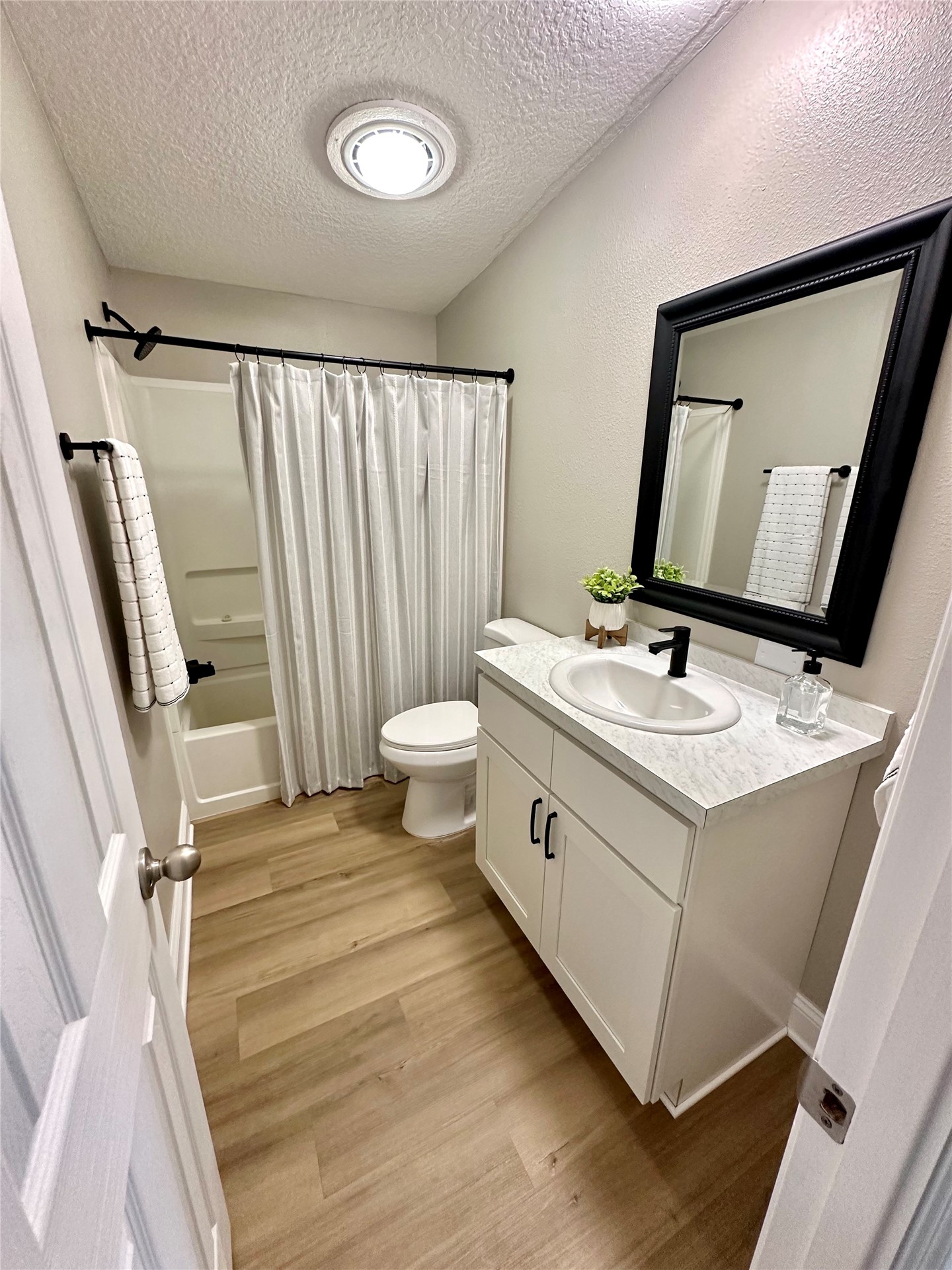54081 Vikki Road Callahan, FL 32011 - Photo 4 of 6 a bathroom with a sink and a mirror