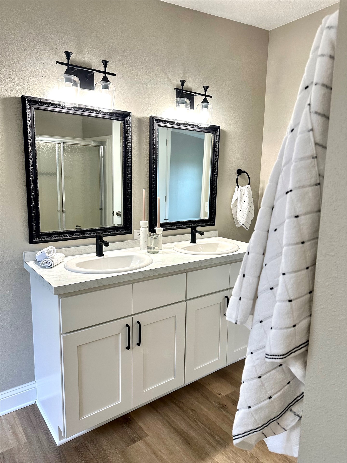 54081 Vikki Road Callahan, FL 32011 - Photo 5 of 6 a bathroom with double vanity and a mirror