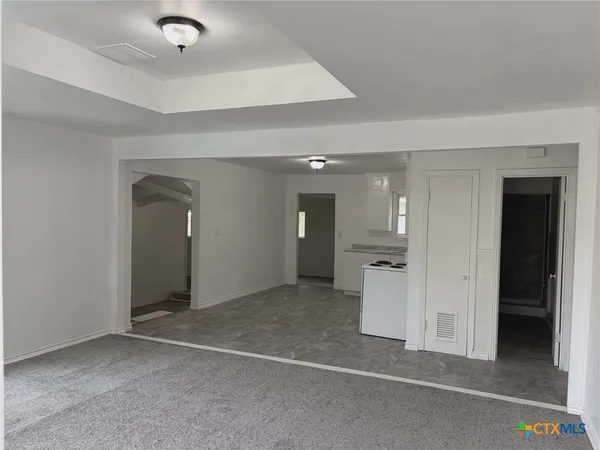 a bathroom with a toilet a sink and bathtub