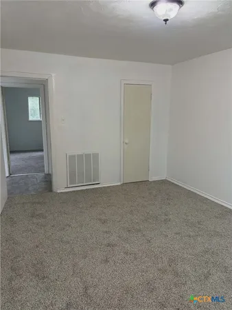 an empty room with a window