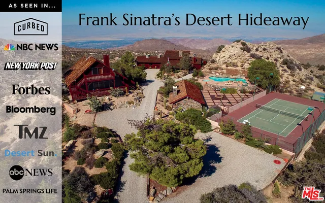 an aerial view of residential house and green space