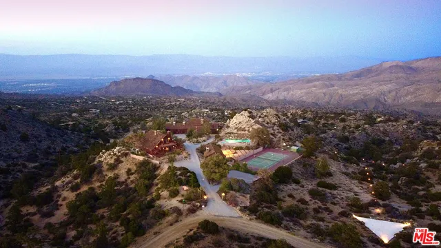 a view of a street with lots of trees