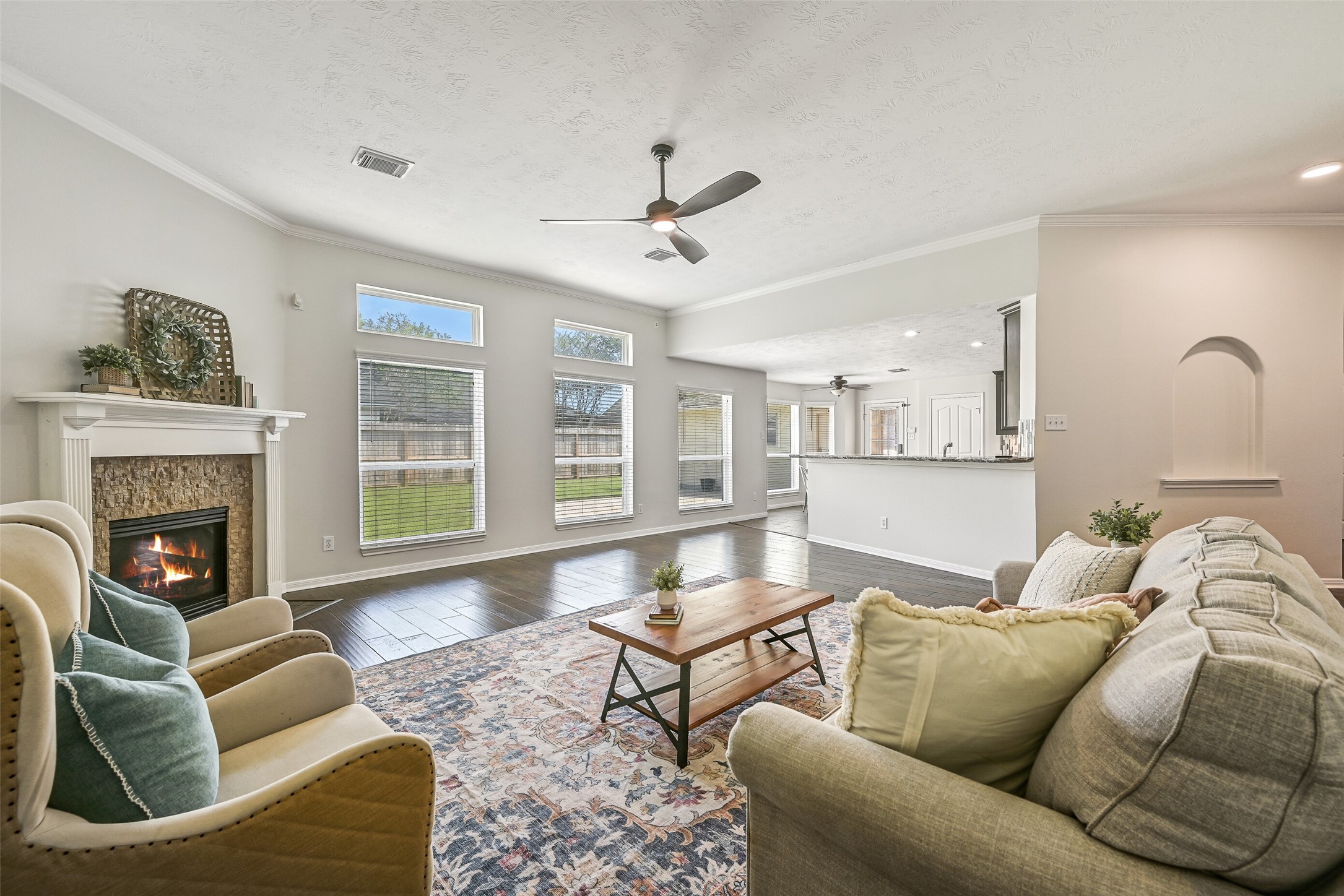 2015 Stonecrest Way Pearland, TX 77581 - Photo 11 of 26 a living room with furniture and a fireplace