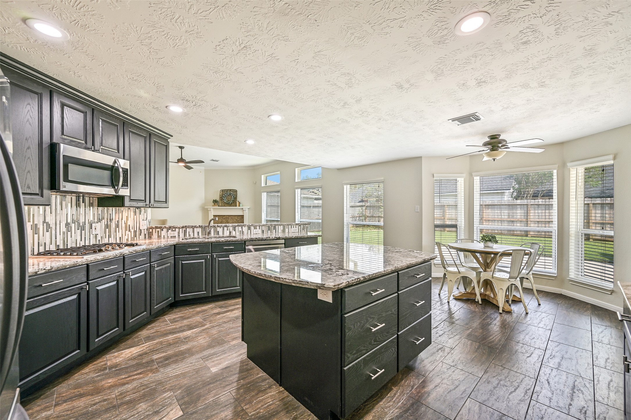 2015 Stonecrest Way Pearland, TX 77581 - Photo 16 of 26 a large kitchen with granite countertop lots of counter top space