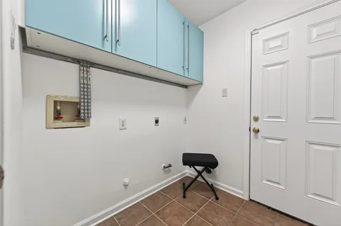 a view of room with cabinets
