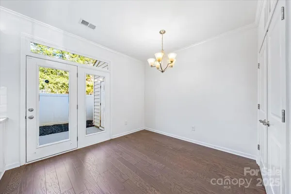 a very nice looking room with wooden floor
