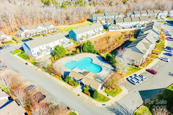 an aerial view of a swimming pool