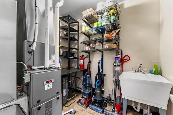 a view of a storage and utility room