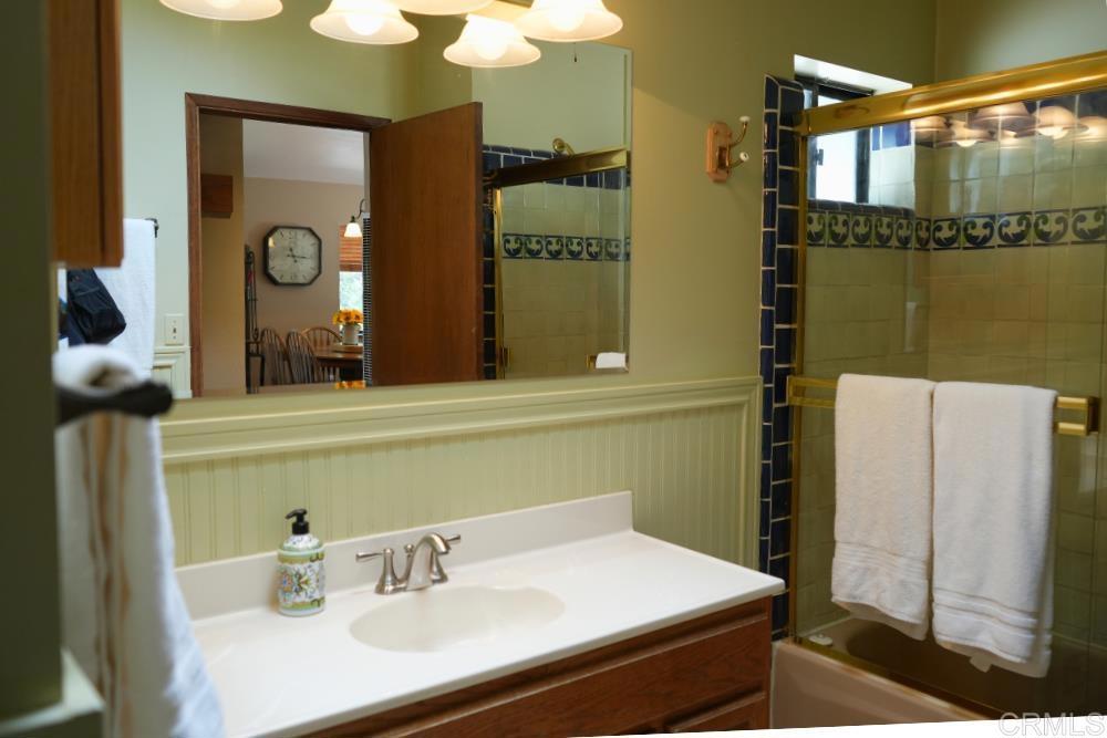 7192 Sandy Creek Road Julian, CA 92036 - Photo 16 of 64 a bathroom with a sink and a mirror