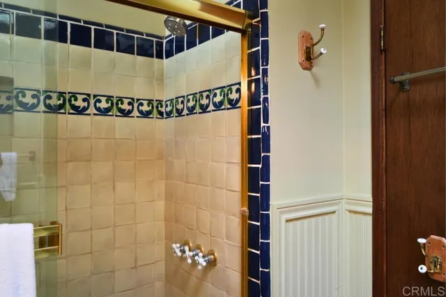 a view of a patio with chairs and wooden floor