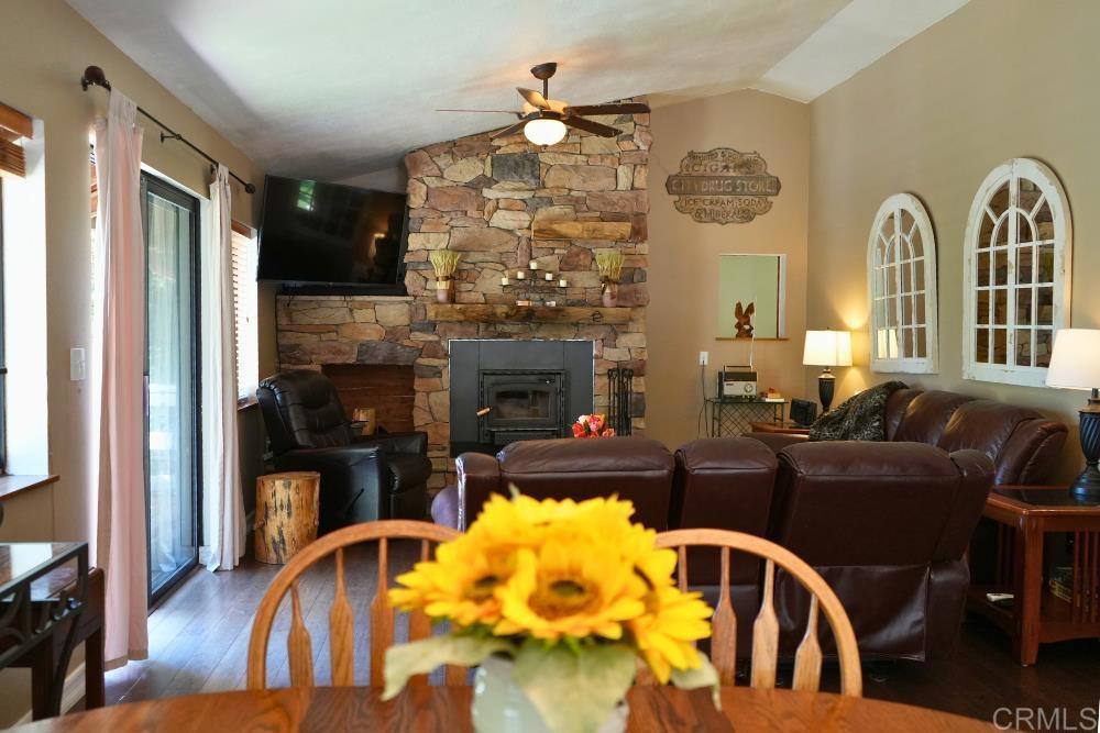 7192 Sandy Creek Road Julian, CA 92036 - Photo 6 of 64 a living room with fireplace furniture and a window