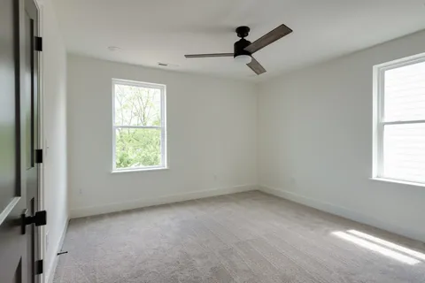 a view of empty room with windows