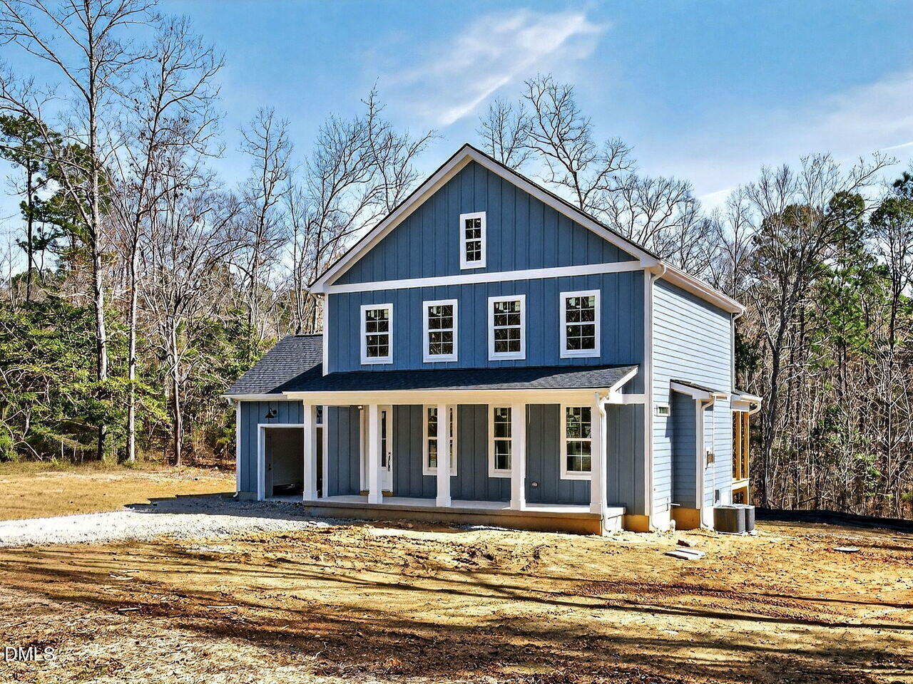 371 Water Tower Road Moncure, NC 27559 - Photo 3 of 11 a front view of a house with a yard