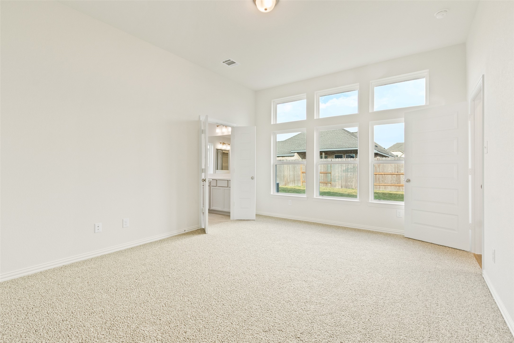 431 Fields Forest Lane Dayton, TX 77535 - Photo 16 of 36 an empty room with windows