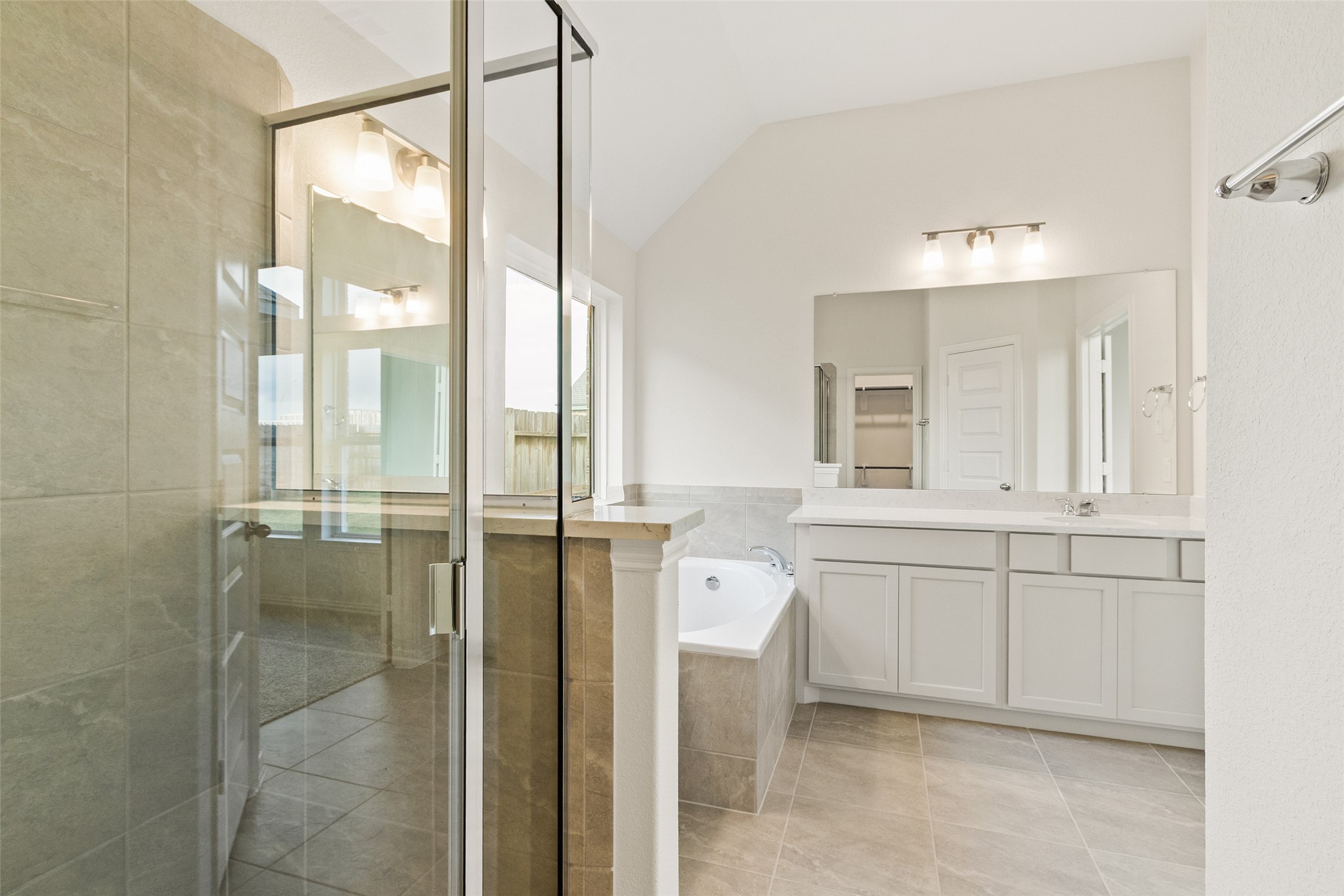 431 Fields Forest Lane Dayton, TX 77535 - Photo 19 of 36 a bathroom with a shower sink and mirror