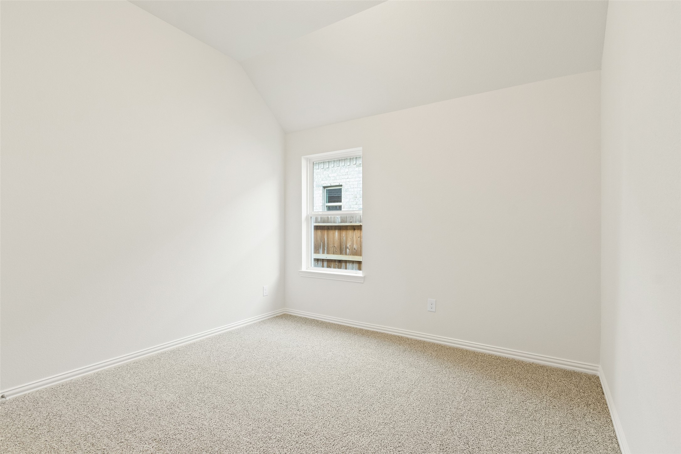 431 Fields Forest Lane Dayton, TX 77535 - Photo 21 of 36 a view of an empty room with a window