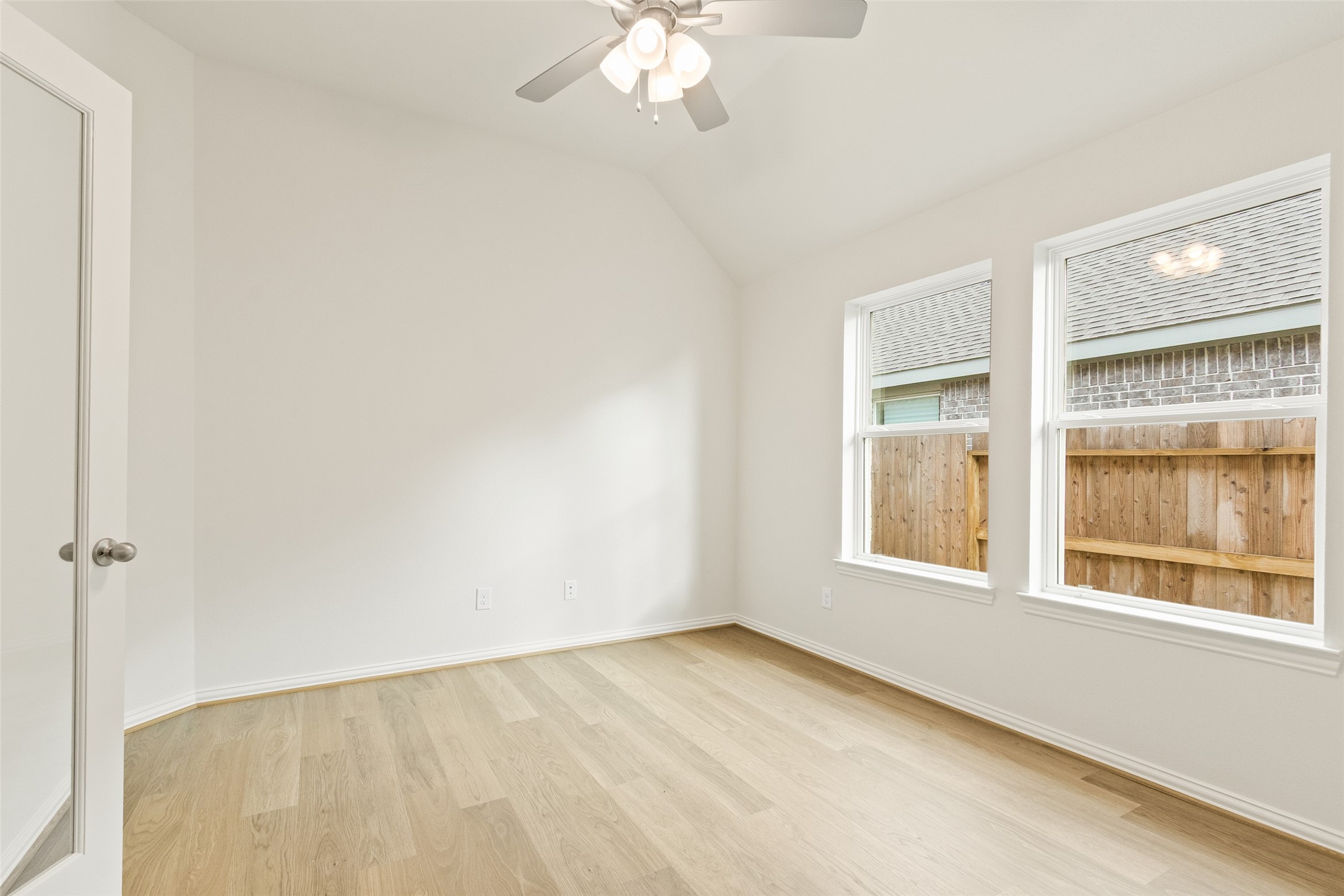 431 Fields Forest Lane Dayton, TX 77535 - Photo 27 of 36 a view of an empty room with a window