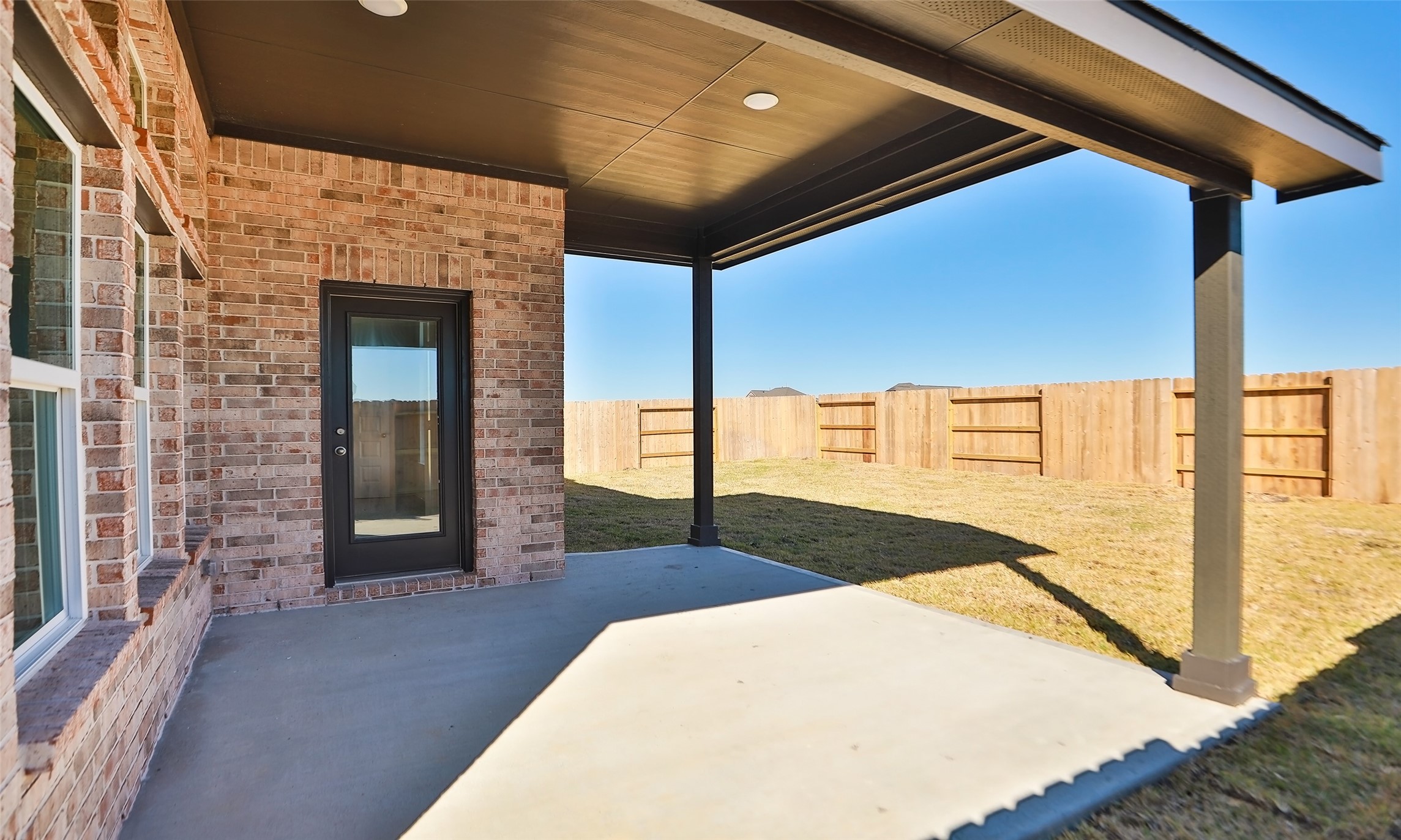 431 Fields Forest Lane Dayton, TX 77535 - Photo 31 of 36 a view of a hallway with the front door