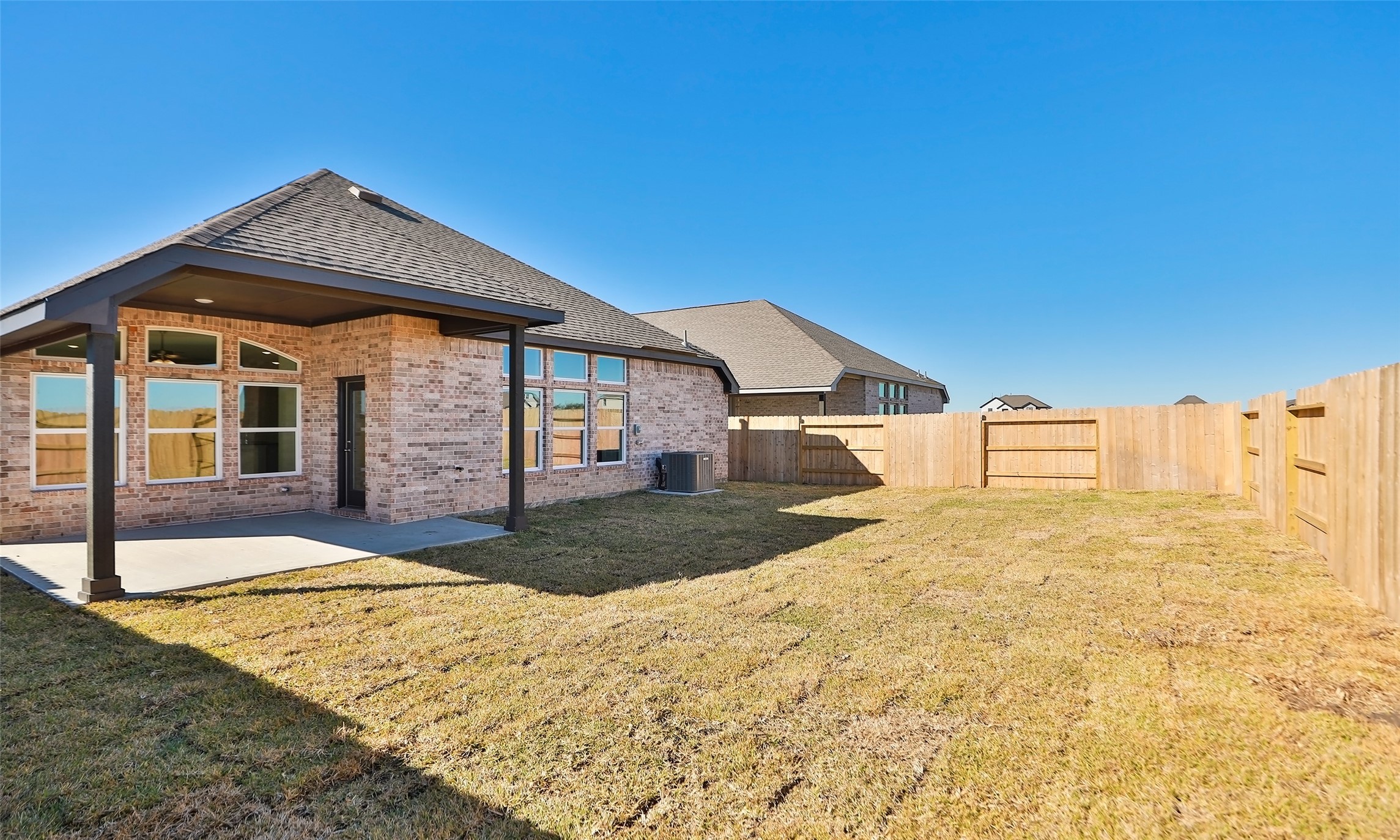 431 Fields Forest Lane Dayton, TX 77535 - Photo 33 of 36 a front view of a house with a yard