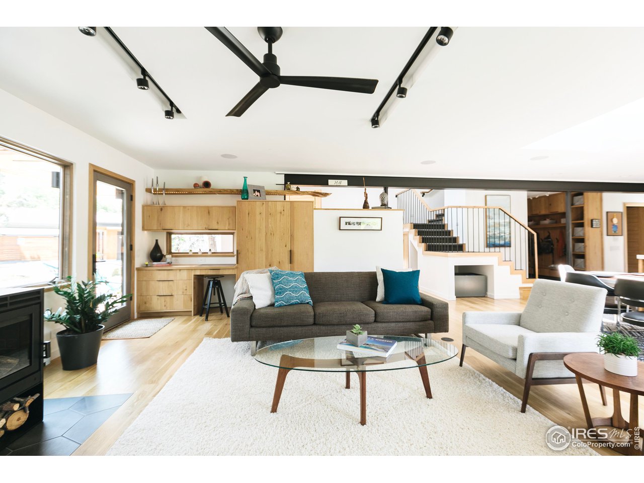 2600 West Prospect Road Fort Collins, CO 80526 - Photo 12 of 40 a living room with furniture and a large window