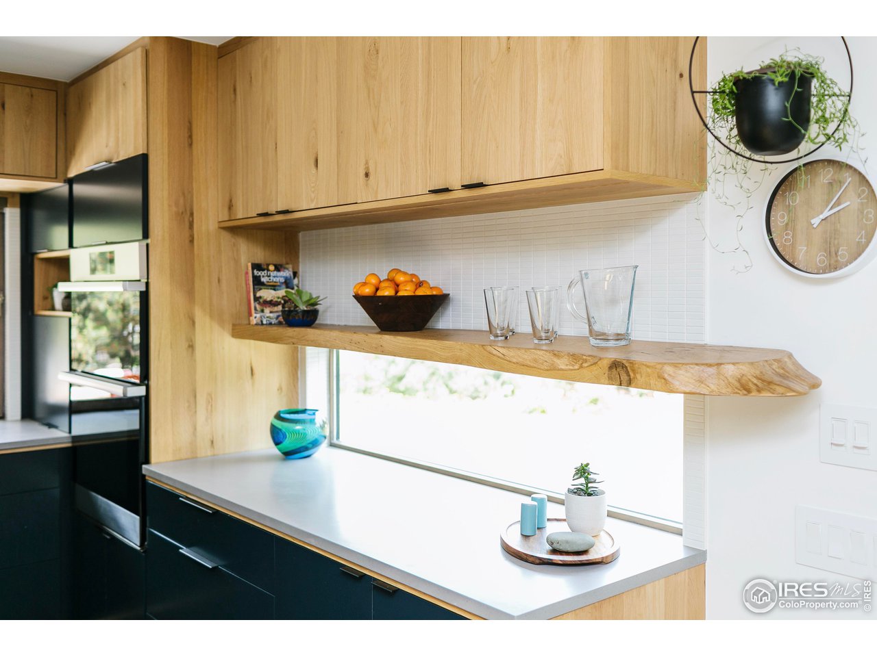 2600 West Prospect Road Fort Collins, CO 80526 - Photo 13 of 40 a kitchen with a sink and a stove