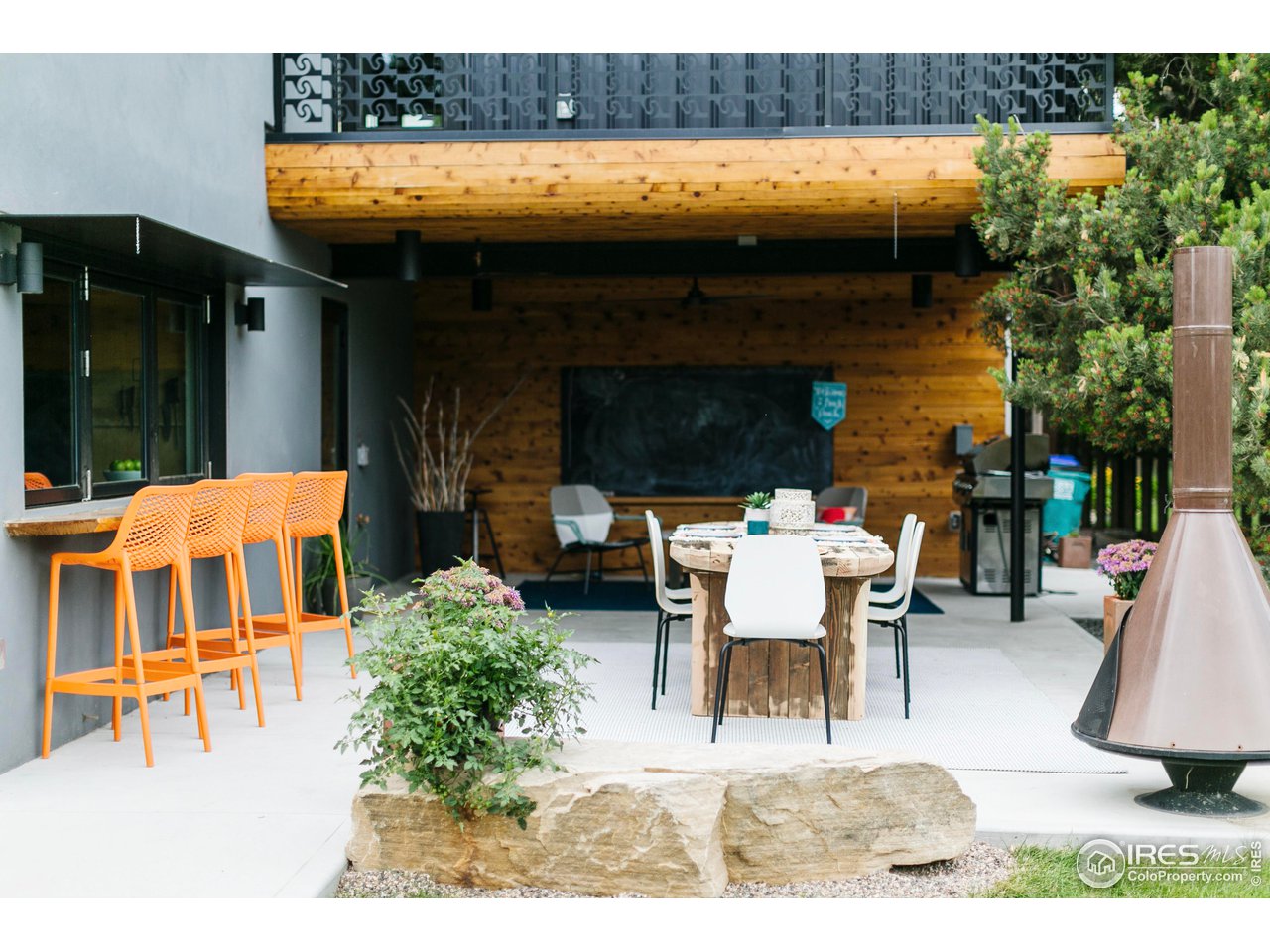 2600 West Prospect Road Fort Collins, CO 80526 - Photo 22 of 40 a outdoor space with the couches and a fireplace