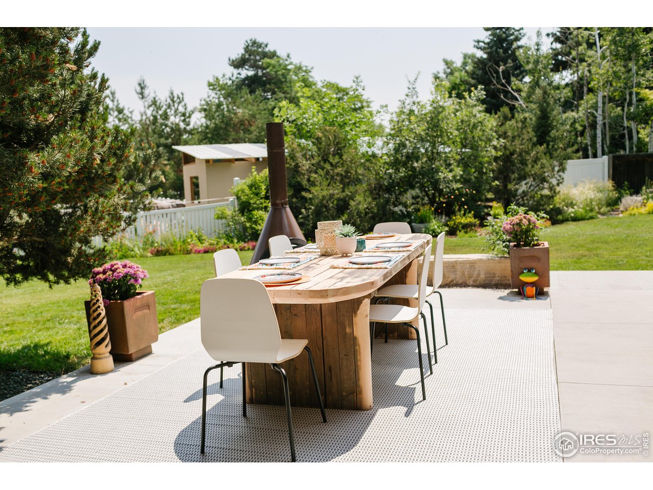 2600 West Prospect Road Fort Collins, CO 80526 - Photo 25 of 40 a outdoor dining space with furniture and garden