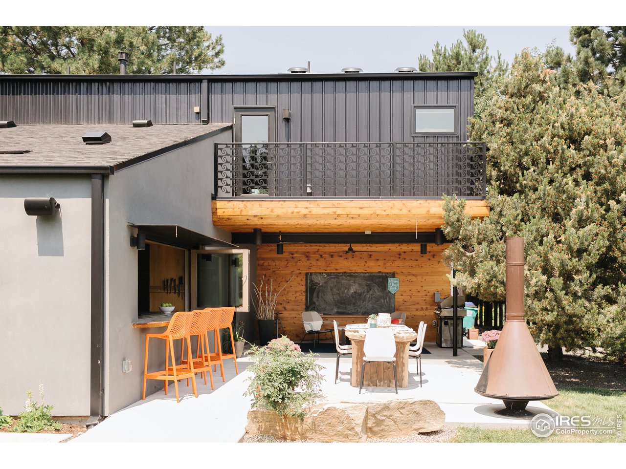 2600 West Prospect Road Fort Collins, CO 80526 - Photo 26 of 40 a view of a patio with table and chairs
