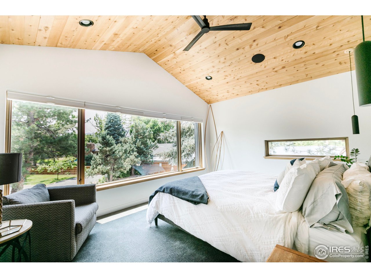 2600 West Prospect Road Fort Collins, CO 80526 - Photo 28 of 40 a living room with furniture and a large window