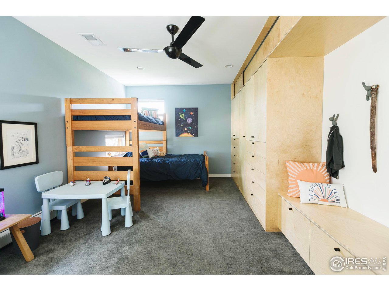 2600 West Prospect Road Fort Collins, CO 80526 - Photo 33 of 40 a living room with furniture and a flat screen tv