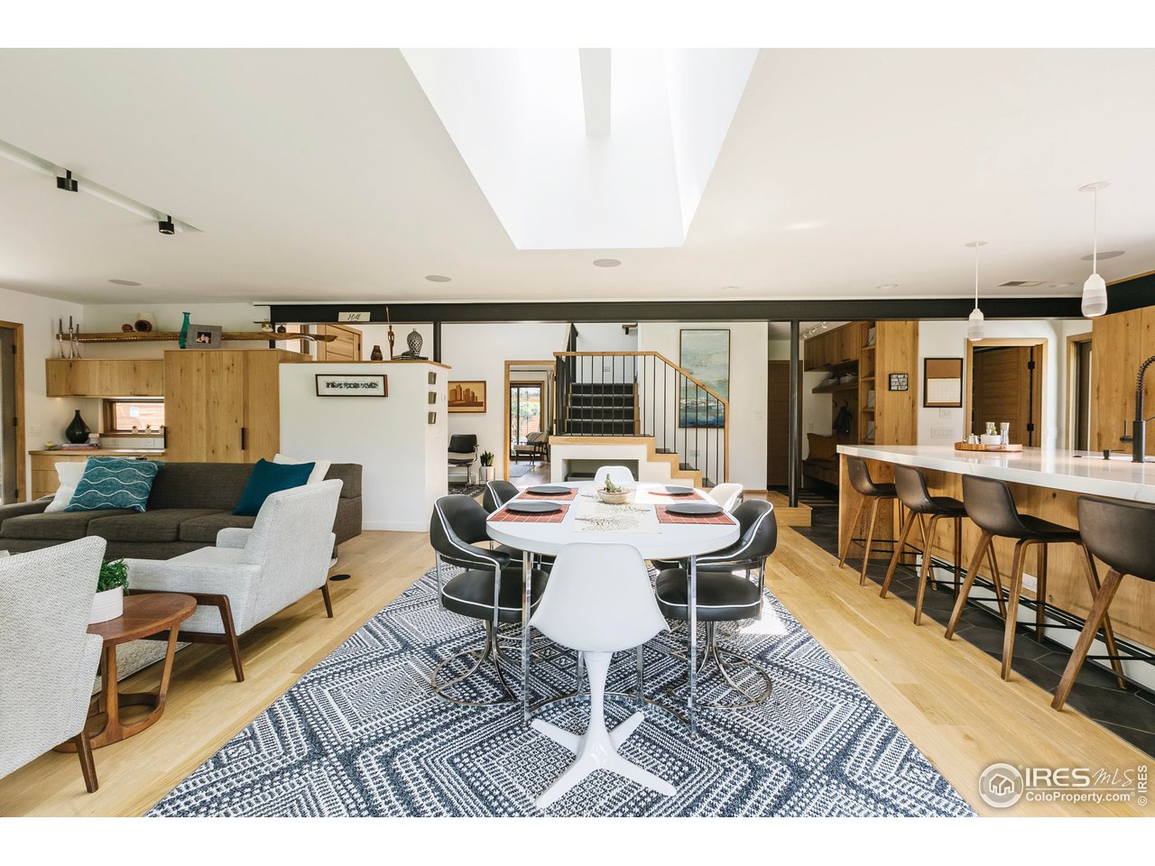 2600 West Prospect Road Fort Collins, CO 80526 - Photo 7 of 40 a living room with lots of furniture and white walls
