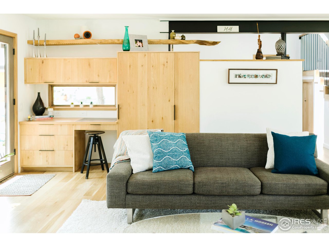 2600 West Prospect Road Fort Collins, CO 80526 - Photo 10 of 40 a living room with furniture and a fireplace
