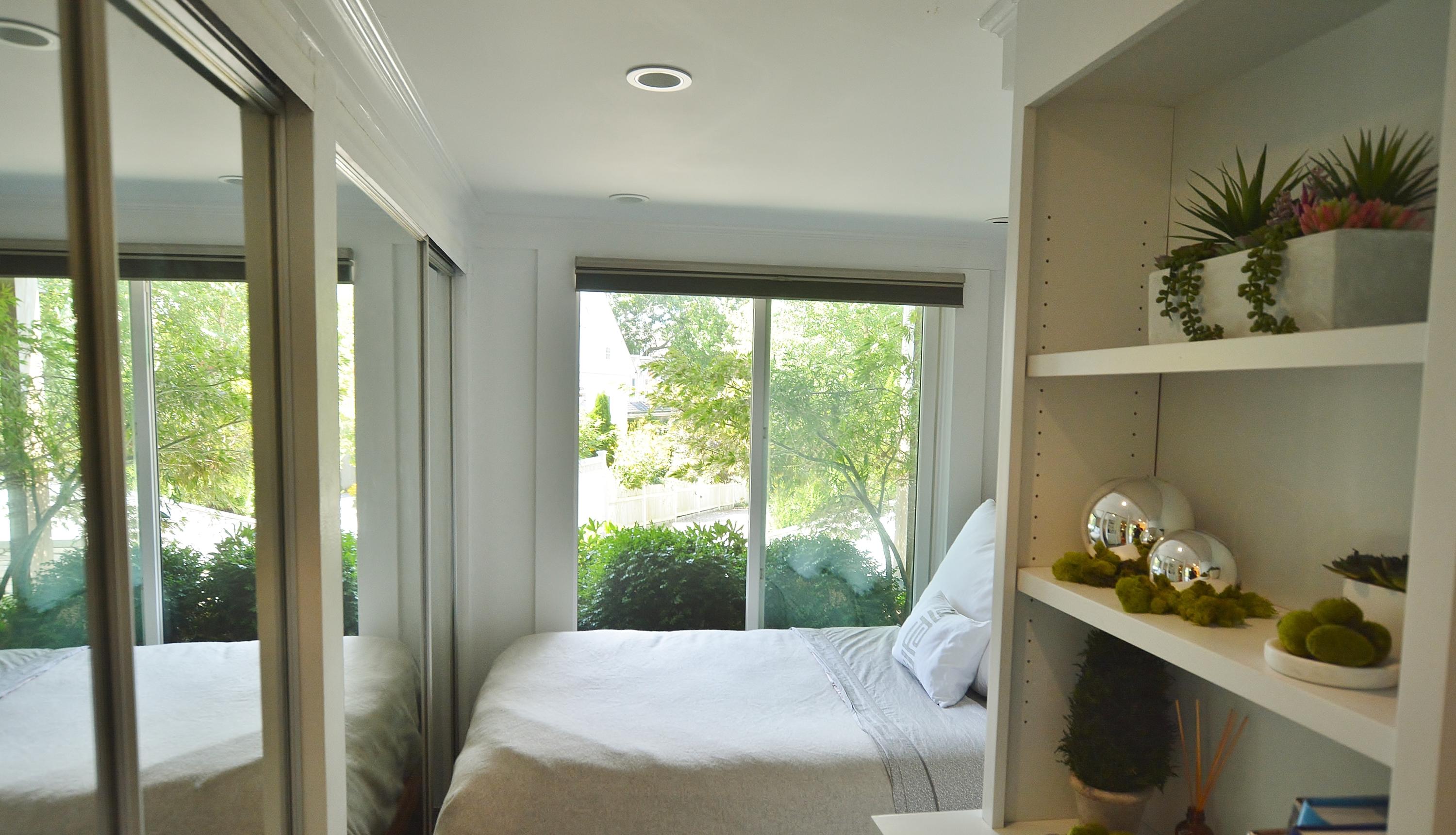 52 R Point Street Provincetown, MA 02657 - Photo 43 of 53 a bed sitting in a bedroom next to a window