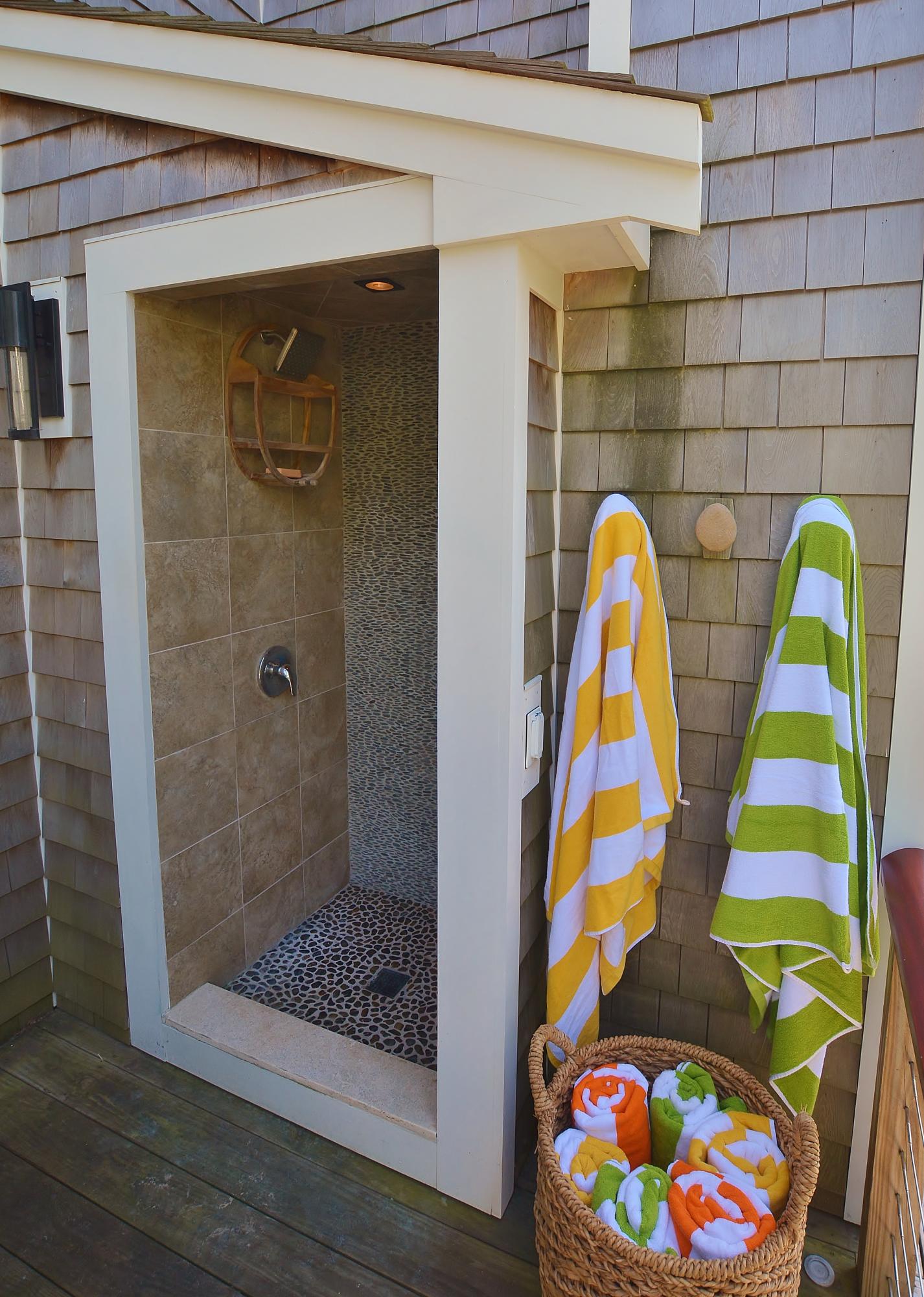 52 R Point Street Provincetown, MA 02657 - Photo 45 of 53 a bathroom with a bathtub and a shower