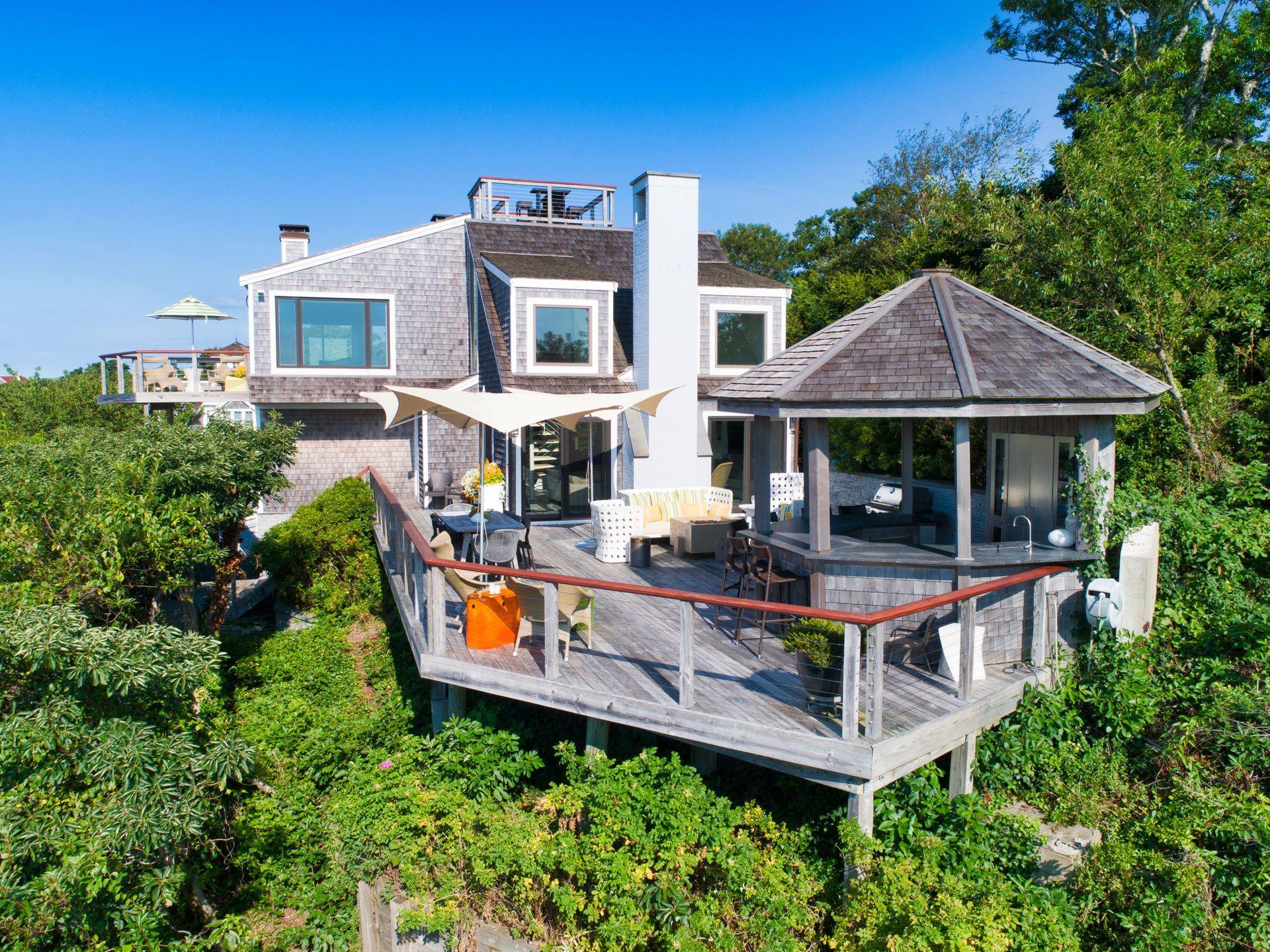 52 R Point Street Provincetown, MA 02657 - Photo 8 of 53 an aerial view of a house with swimming pool garden and patio