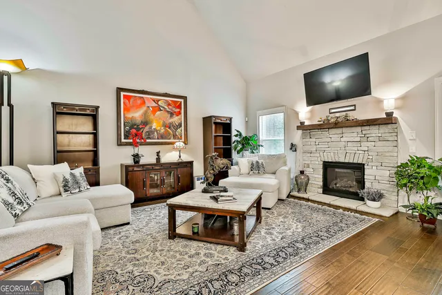 a bathroom with a toilet a sink and a mirror