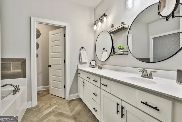 a view of a entryway door with wooden floor