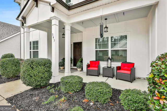 a house view with a garden space