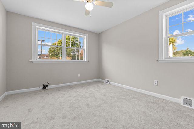 5477 Houghton Place, Unit 2 Philadelphia, PA 19128 - Photo 13 of 17 a view of an empty room with windows