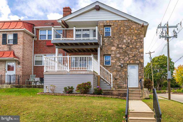 5477 Houghton Place, Unit 2 Philadelphia, PA 19128 - Photo 16 of 17 a front view of a house with a yard