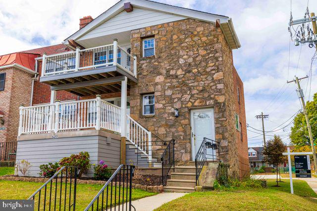 5477 Houghton Place, Unit 2 Philadelphia, PA 19128 - Photo 17 of 17 a view of a house with a balcony