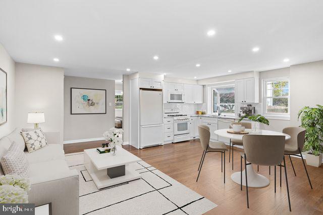 5477 Houghton Place, Unit 2 Philadelphia, PA 19128 - Photo 5 of 17 a living room with furniture and view of kitchen