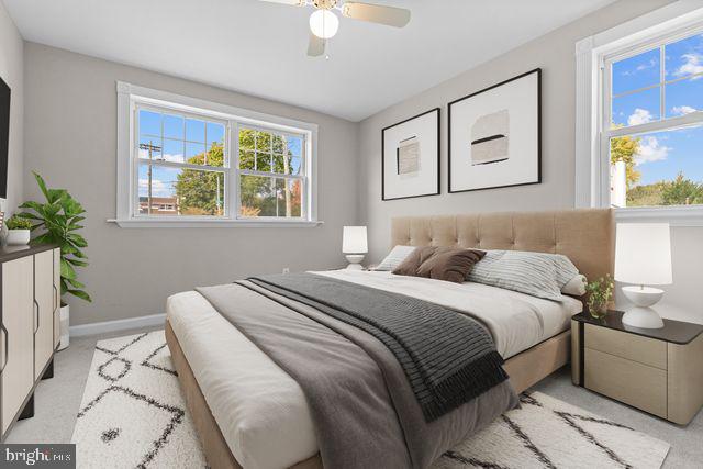 5477 Houghton Place, Unit 2 Philadelphia, PA 19128 - Photo 7 of 17 a bedroom with a bed and a window