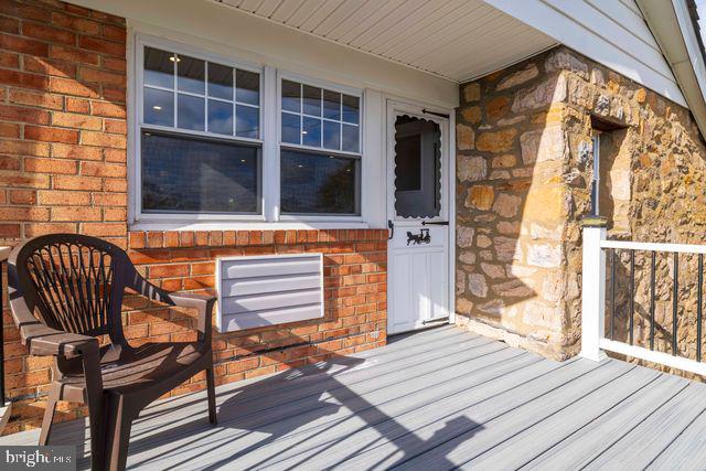 5477 Houghton Place, Unit 2 Philadelphia, PA 19128 - Photo 10 of 17 a view of wooden balcony with a lounge chair