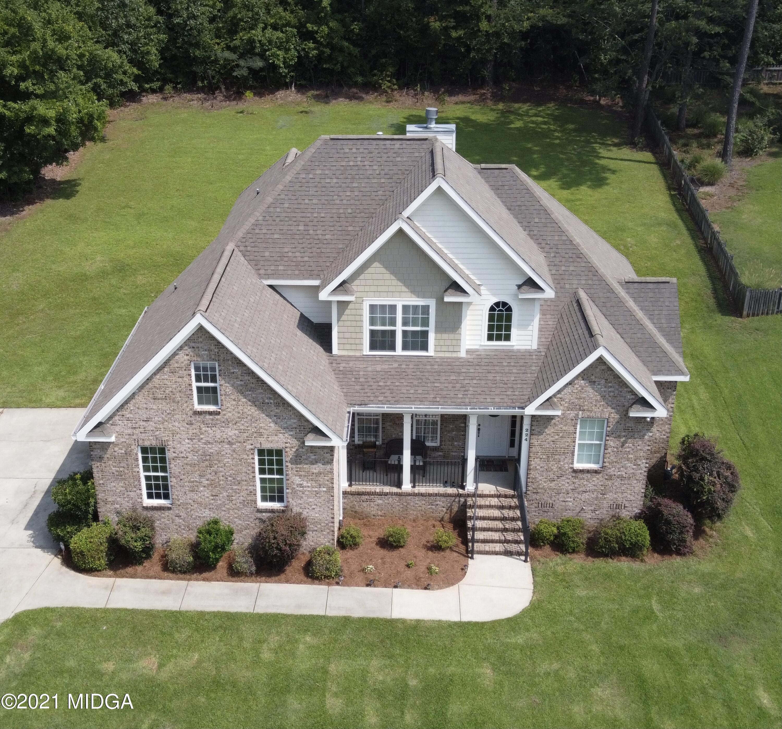 224 Carsons Walk Macon, GA 31206 - Photo 2 of 41 a front view of house with yard and green space