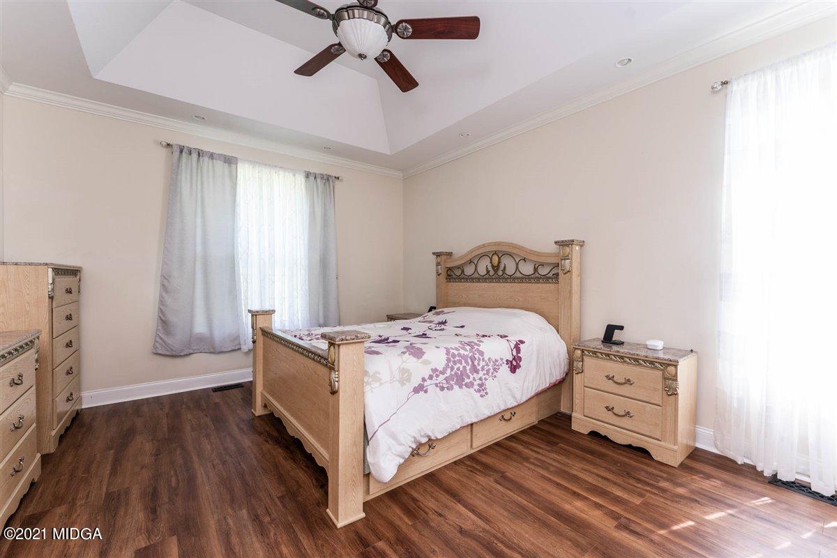 224 Carsons Walk Macon, GA 31206 - Photo 17 of 41 a bedroom with a bed and a tv