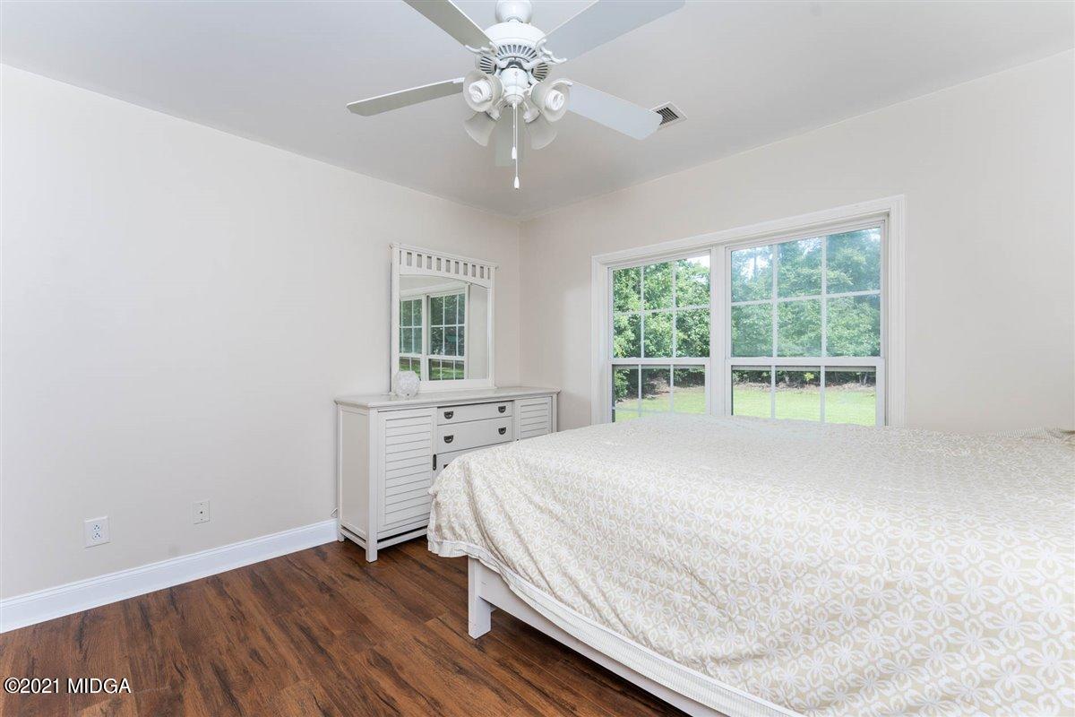224 Carsons Walk Macon, GA 31206 - Photo 22 of 41 a bedroom with a bed and a window