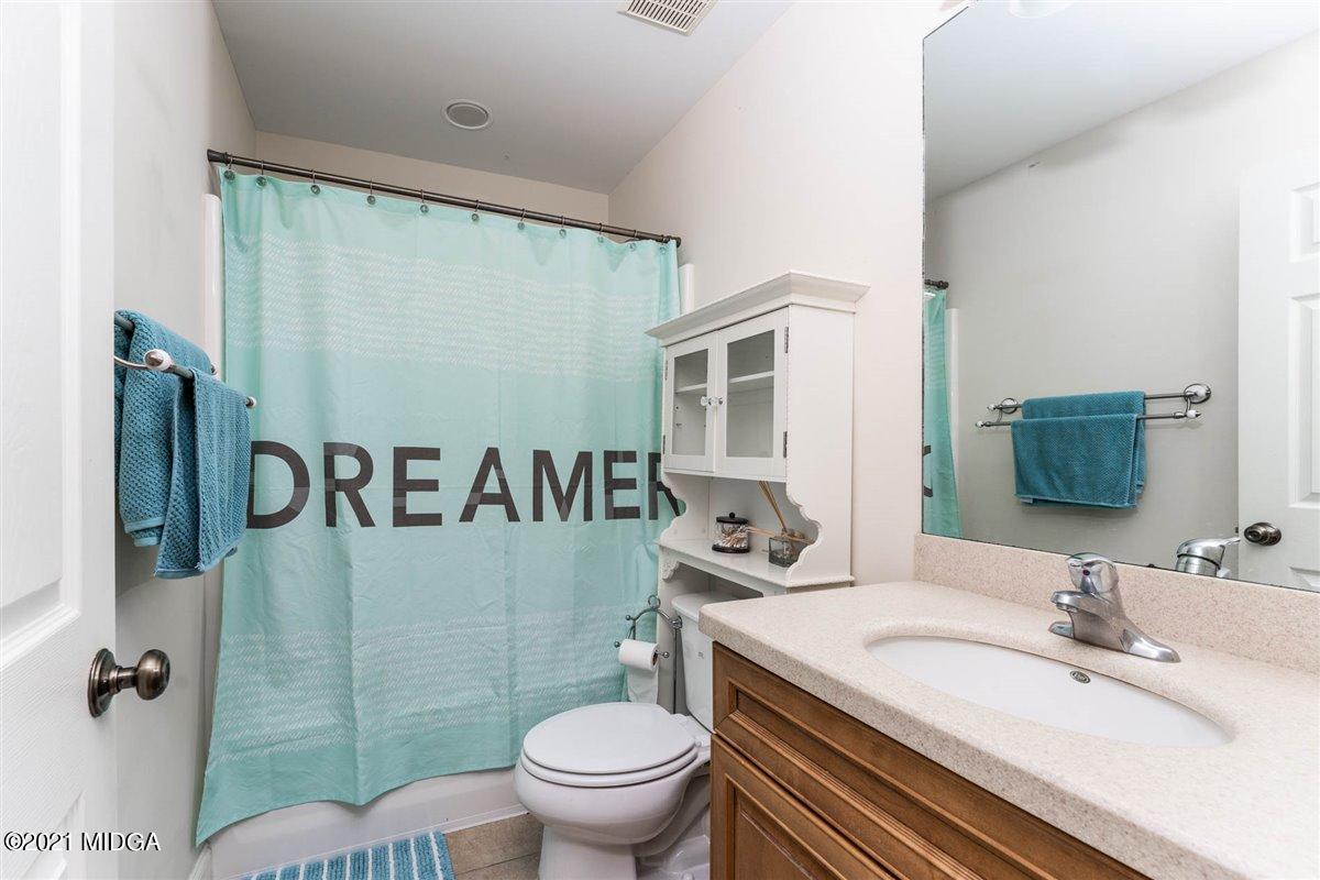 224 Carsons Walk Macon, GA 31206 - Photo 24 of 41 a bathroom with a granite countertop sink toilet and shower