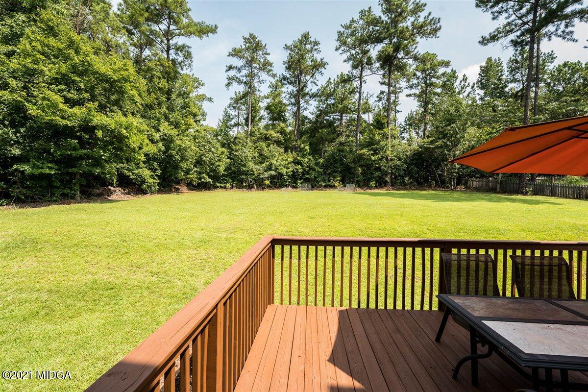 224 Carsons Walk Macon, GA 31206 - Photo 30 of 41 a view of a balcony with wooden floor and fence