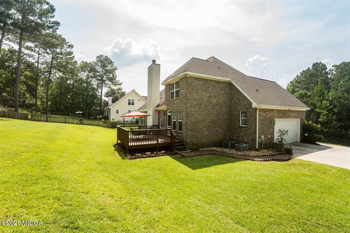 224 Carsons Walk Macon, GA 31206 - Photo 31 of 41 a view of a house with swimming pool and sitting area